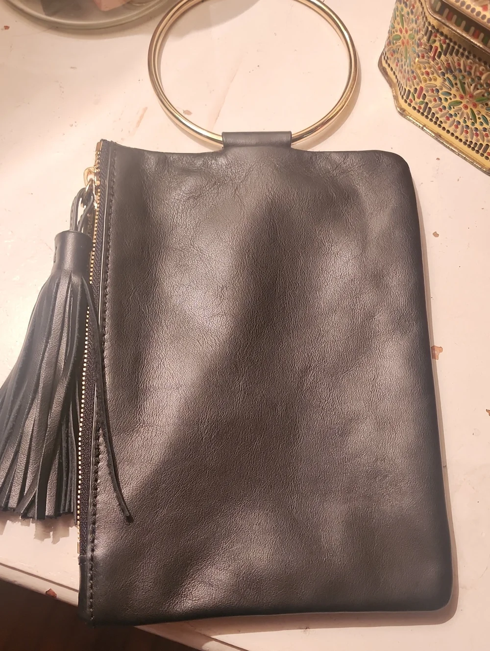 Thacker Black Leather Wristlet Clutch with Gold Ring Handle